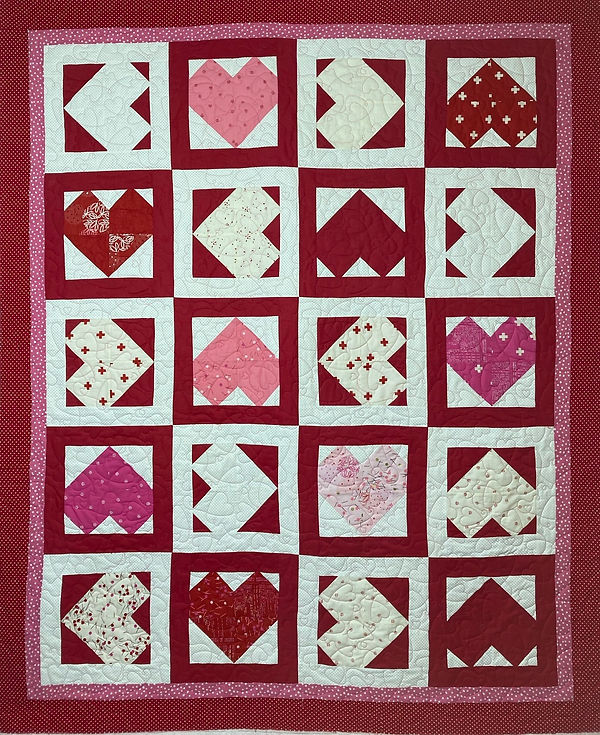 Valentine quilt longarm quilting by Apple Basket Quilting.jpg