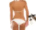 Backside of woman in white bikini getting a custom spray tan