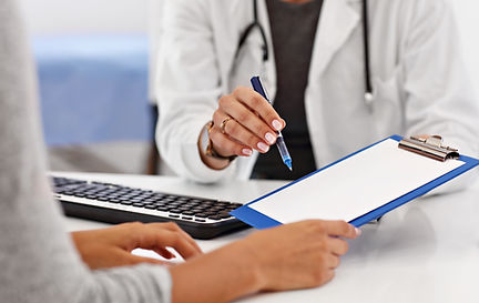 adult-woman-having-visit-female-doctor-s-office.jpg