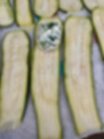 Add filling to zucchini