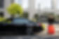 chauffeur-packs-a-suitcase-into-luxury-car-2023-11-27-05-19-12-utc.JPG