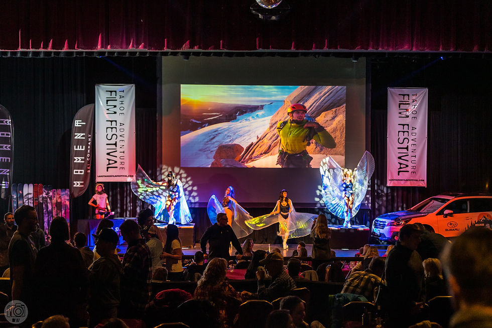 Performers on stage to learn about the film festival.