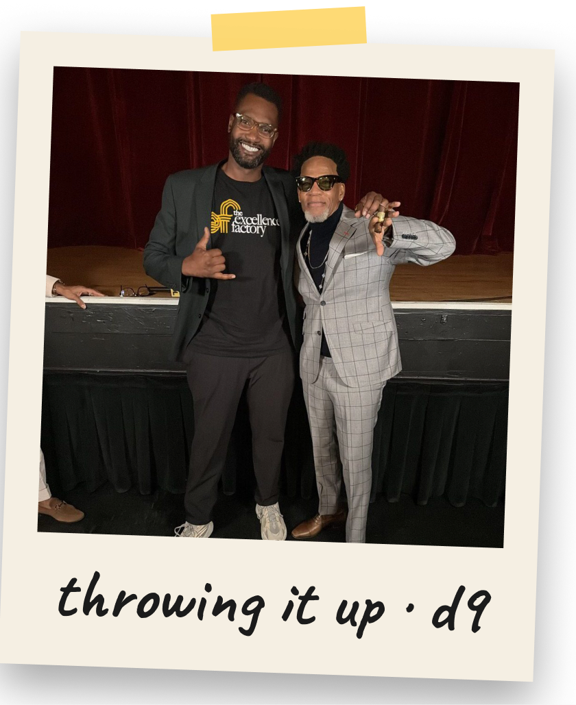 Polaroid of DéRecco Lynch and D.L. Hughley throwing up their hand signs
