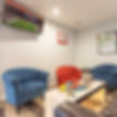relaxing area with snacks and football on the tv