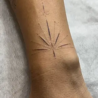 Fine line wrist tattoo Budva, minimalist geometric star tattoo Montenegro, dainty dotwork tattoo art, professional tattoo studio in Budva