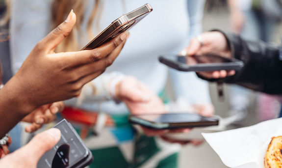 People using smartphones