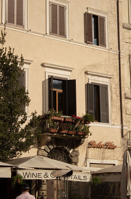 Beige Italian style building restaurant named Dolce Vita