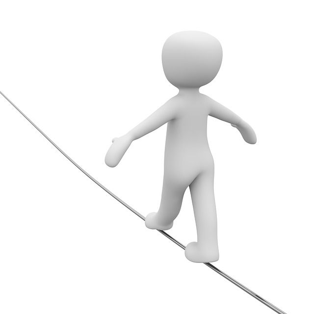 Graphic illustration of figure walking a tight rope.