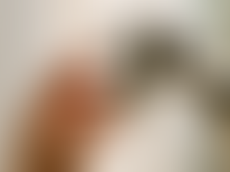 A human hand reaching toward a robotic hand.