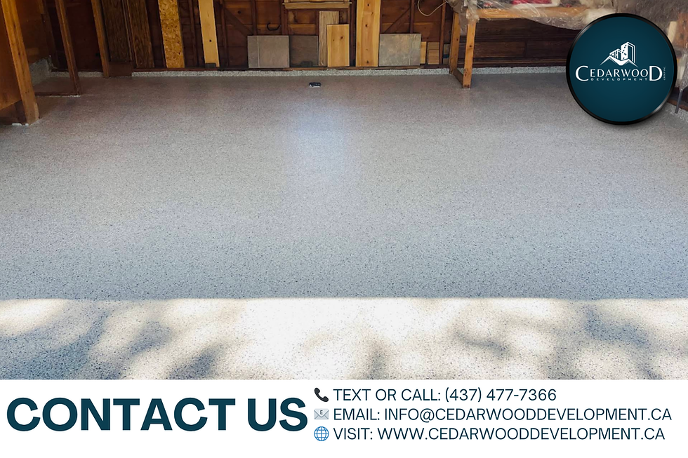 Smooth gray epoxy garage floor installed by Cedarwood Development Group Inc. in Toronto – contact us for professional epoxy flooring services in the GTA