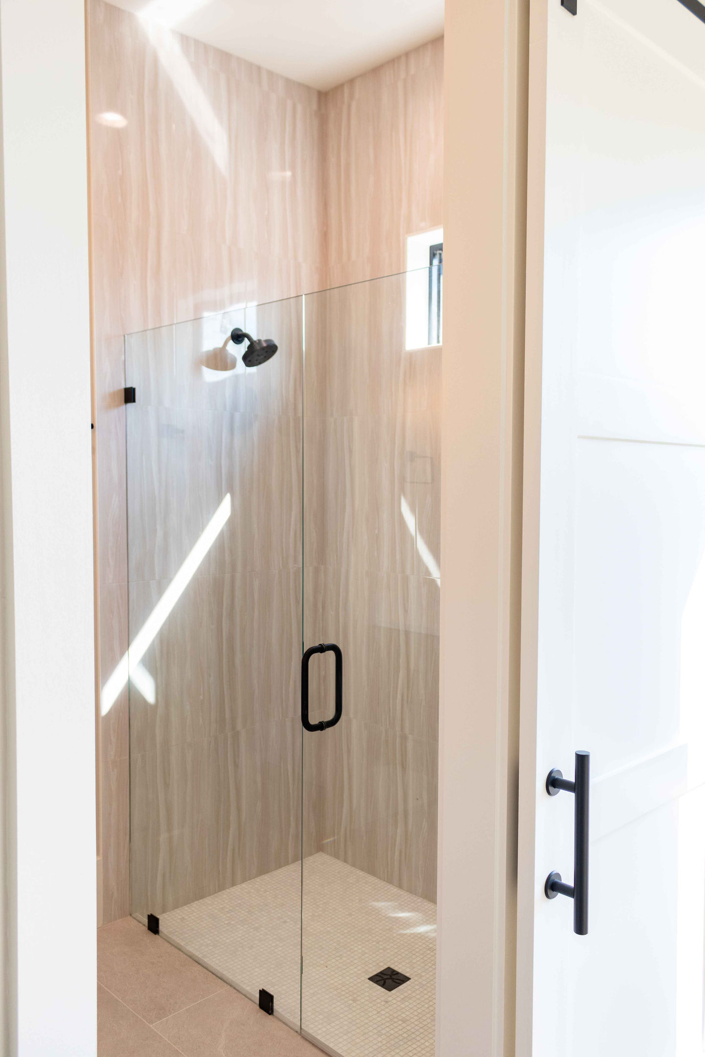 Coastal modern shower. Photo by Southern Marketing Solutions
