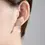 Thumbnail: bride wearing wedding earrings pearl and crystal