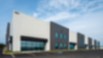 white and black building with 4 units