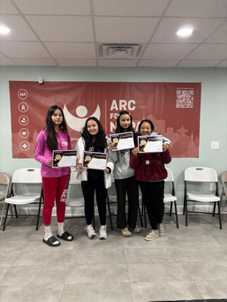 Group photo of people in front of a "ARC for Nepal" banner - highlighting their blood donation during the ARC for Nepal blood drive.