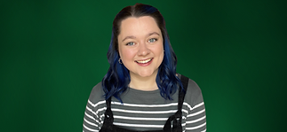 Rhiannon Carter confidence coach smiling to camera.png