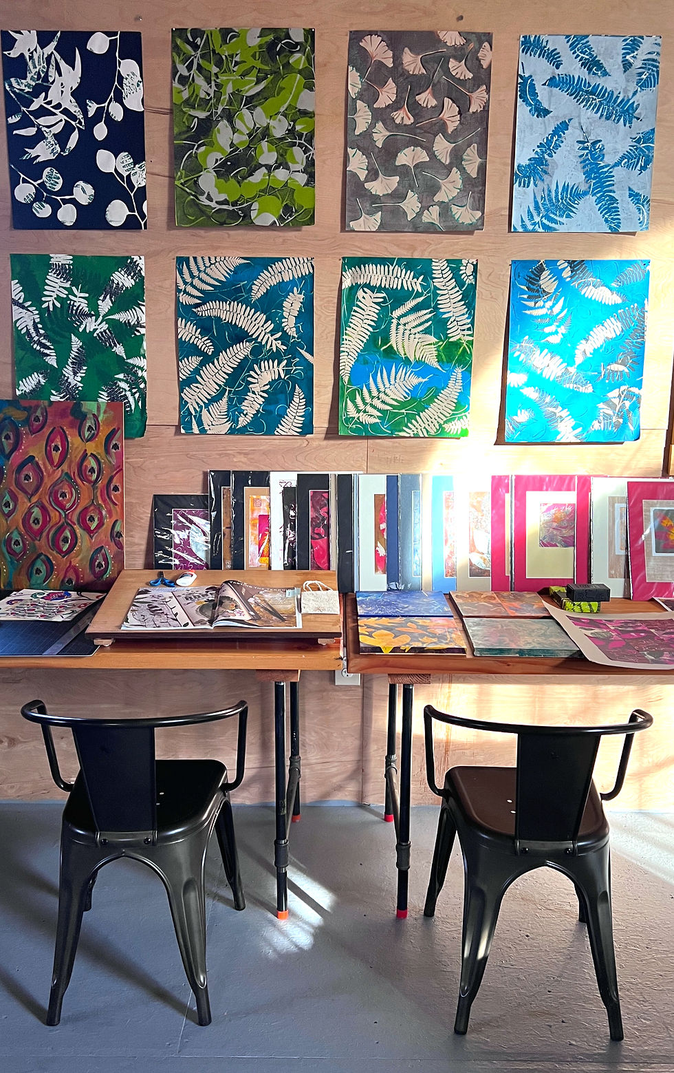 My studio set up in the honey house barn at Red Bee. Prints hang on the wall to inspire me.