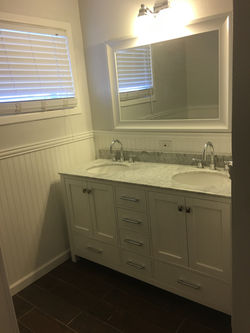 Remodeled bathroom with two sinks