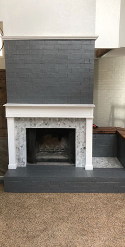 Fresh paint and trim around fireplace