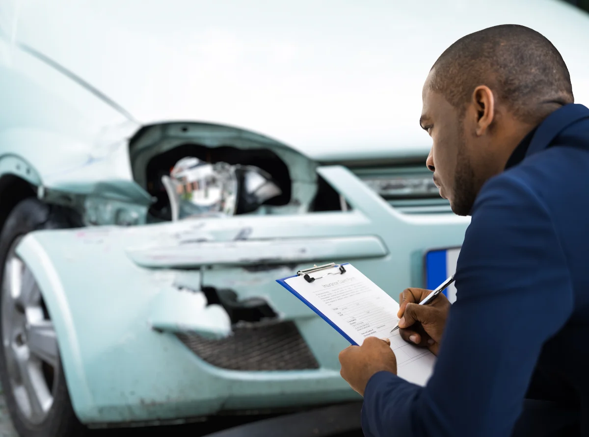 How do adjusters collaborate with insurance agents?