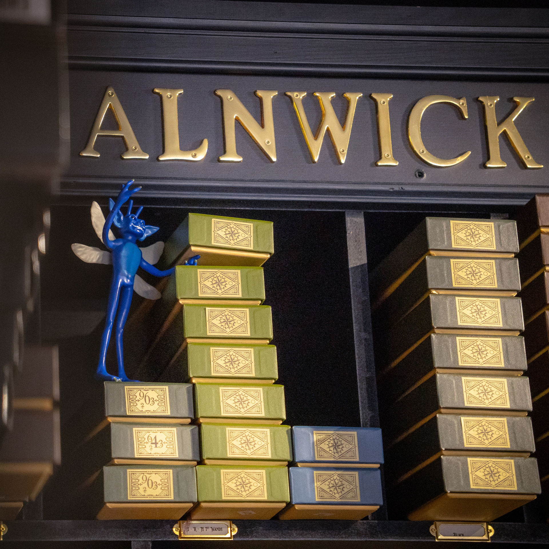 A Cornish Pixie peeks out from between the wand boxes at Bowring Hepple Black