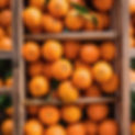oranges inside a wooden crate.jpg