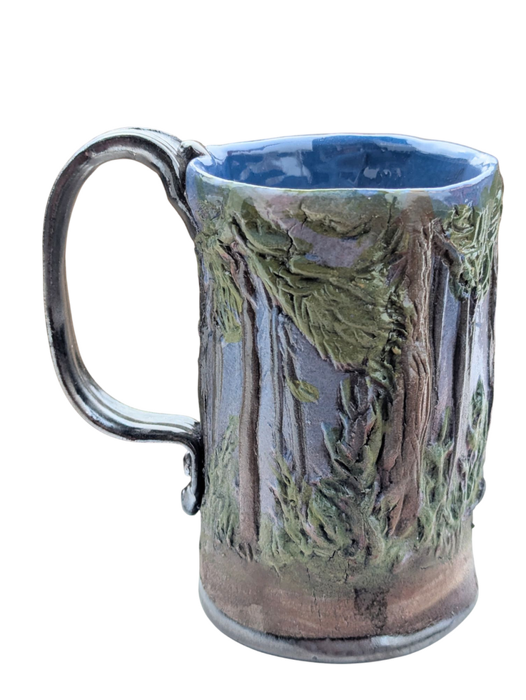 Hand-painted forest mug, stoneware, blue interior