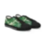 A pair of stylish low-top sneakers with black toes and laces, featuring a striking green and white marble pattern.