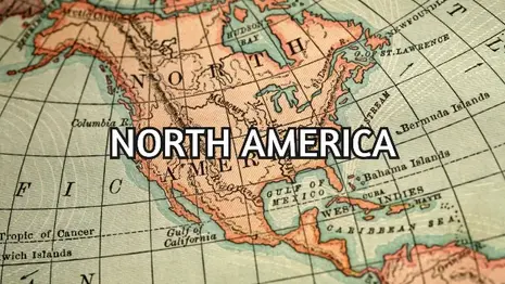A vintage map of North America with a compass on the left. Large text across the center reads "NORTH AMERICA."