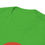 Thumbnail: Close up of a plain white T-shirt with a round neckline and a visible shoulder seam.