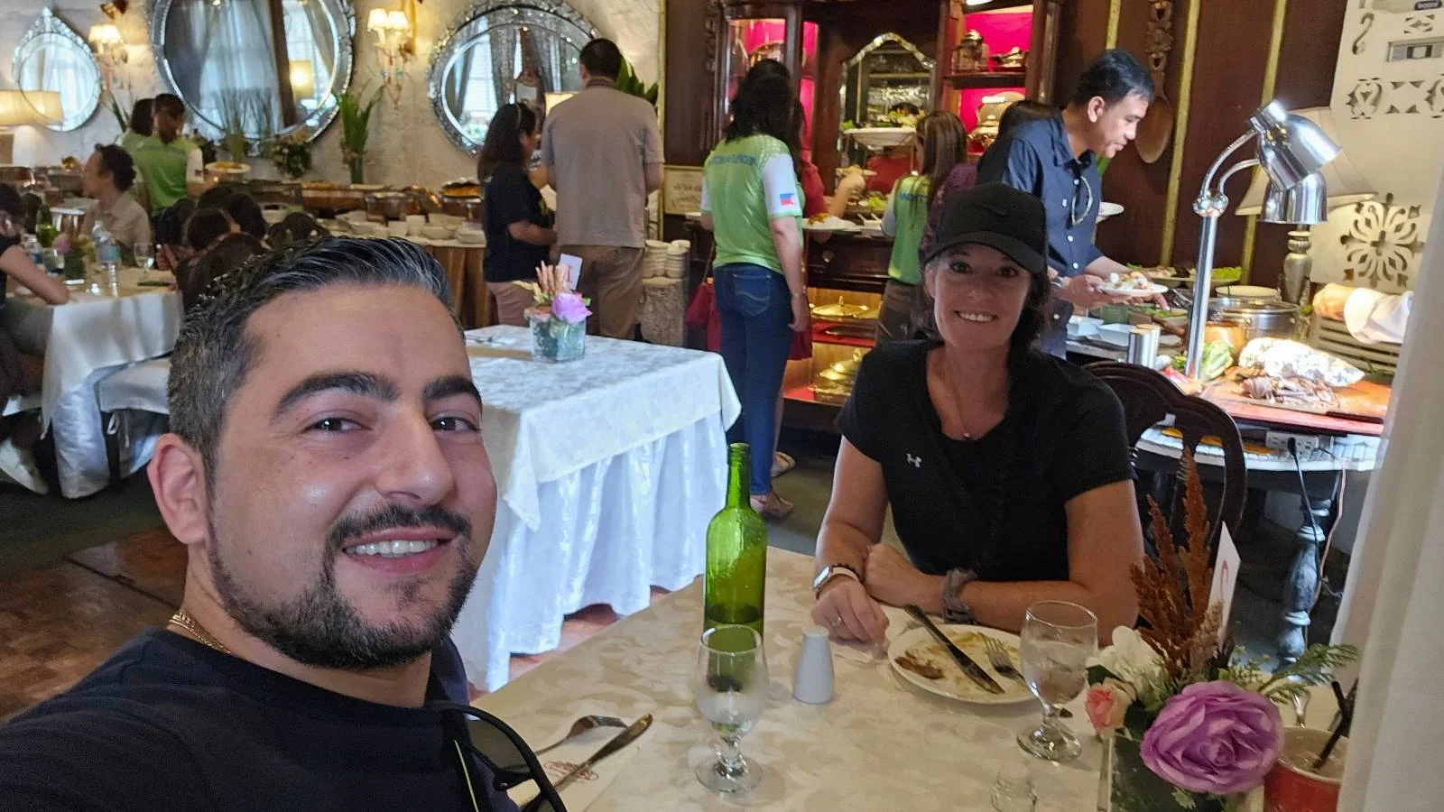 A man and a woman sitting at a table in Barbara's Heritage Restaurant