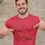 Thumbnail: A smiling man wearing a red T-shirt with a simple turkey illustration and the words "I'm stuffed".