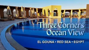 Sunlit pool and loungers with marina views at Three Corners Ocean View Hotel Resort in El Gouna, Red Sea, Egypt.