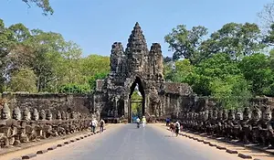 South Gate of Angkor Thom with stone faces lining the causeway, Siem Reap, Cambodia.