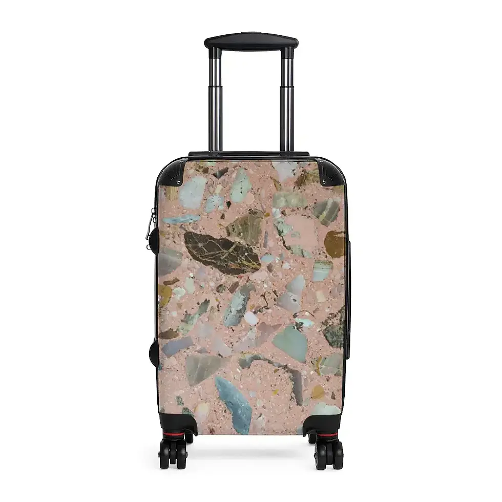 Thumbnail: A stylish hard-shell suitcase with an abstract, multicolored pattern featuring shades of pink, brown, and blue.