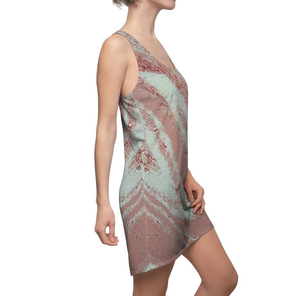 A person wearing a racerback dress with a brushed pink marble effect showing the side view.