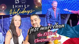 People smiling at a holiday festival with fireworks. Text reads "Light Up the Holidays" and "Jose Mari Chan, the KING of Christmas Carols."