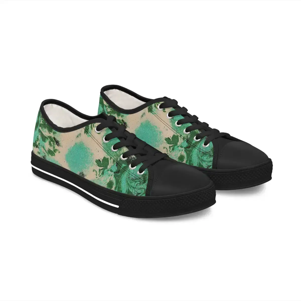 A pair of stylish sneakers with a vibrant green floral pattern on a beige background, featuring black toe caps and soles.