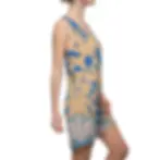 Woman in sleeveless dress with blue patterns
