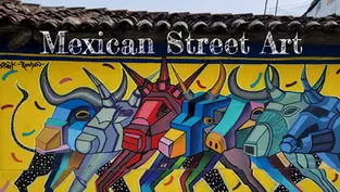 Colorful street art mural of geometric bulls on a yellow background, with "Mexican Street Art" text above. Vibrant and energetic design.