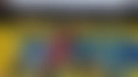 Colorful street art mural of geometric bulls on a yellow background, with "Mexican Street Art" text above. Vibrant and energetic design.