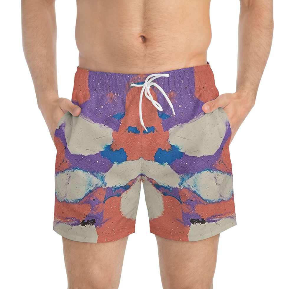 A person wearing Cotton Candy Multicolor Swim Trunks with a symmetrical, abstract pattern stands with hands in pockets.