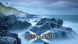 Rocky coastline with waves crashing against the shore. Text reading "Scotland" is superimposed over an image of Scotland's flag.