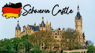 Schwerin Castle with its historical architecture, surrounded by trees. The image includes a German flag with the text "Schwerin Castle" written above the castle.