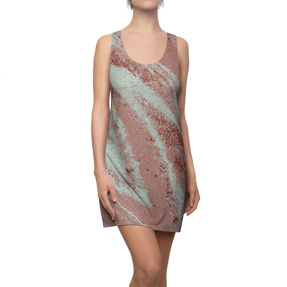 A person wearing a sleeveless racerback dress with a light pink and white brushed marble pattern.