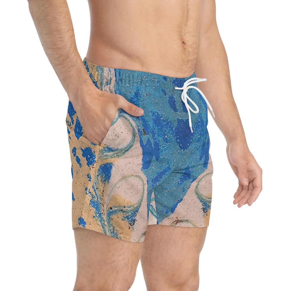 Person wearing Blue & Beige Peacock Feather Swim Trunks with a white drawstring.