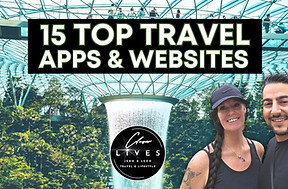 Two smiling people pose in front of a lush indoor garden with a waterfall. Large text above reads "15 Top Travel Apps & Websites." A circular logo at the bottom includes "Lives" and travel lifestyle branding.