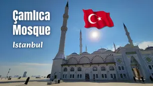 Çamlıca Mosque in Istanbul under blue sky, with Turkish flag and sun overhead; large text labels the landmark.