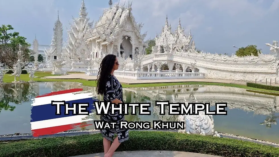 Woman in black dress standing before the ornate White Temple, Wat Rong Khun, with blue sky. Text: "The White Temple."
