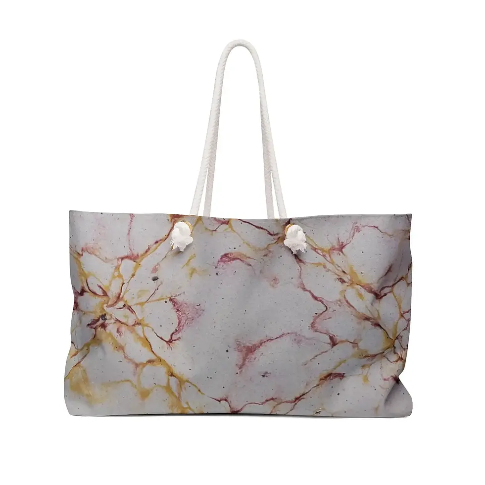 Thumbnail: A stylish tote bag with a marble pattern in shades of gray, gold, and pink, featuring white handles.