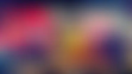 Bright Dotonburi scene at night with a large red octopus sign reading Kukuru, a green dragon, and people bustling under colorful lights.